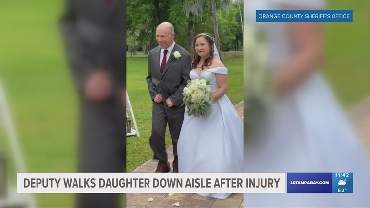 One year after life-altering injury, Florida deputy walks daughter down aisle