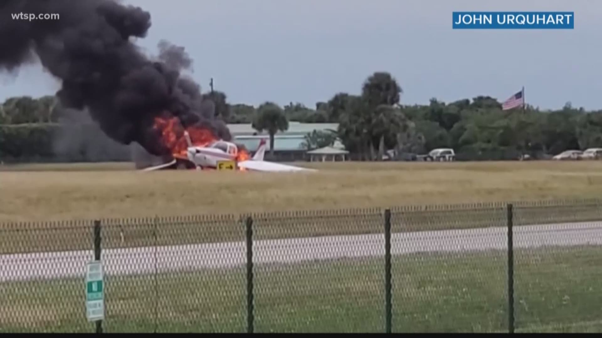 Two men were able to escape their plane after it caught fire at Venice Municipal Airport, prompting operations there to be suspended.
