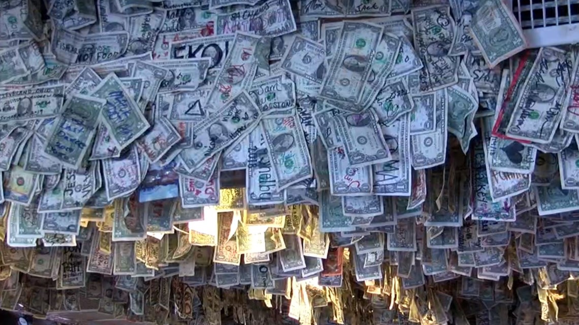 Siesta Key bar uses dollar bills on walls to donate to Bahamas | wtsp.com