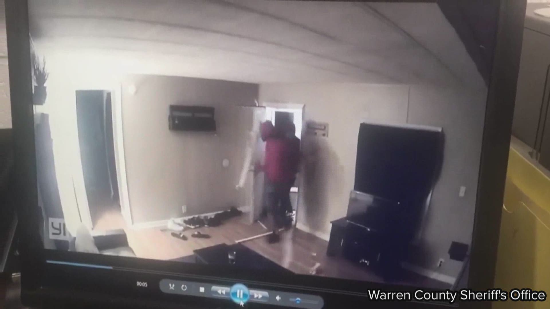 Four armed intruders picked the wrong house in Bowling Green.

Video from the Warren County Sheriff's Office shows four men breaking through the front door and walking into the home. They only make it to the front hallway before the homeowner shoots at them.

All four men jump and run back out the door.

The sheriff's office shared the video in hopes it will help catch the intruders. Sheriff Brett Hightower said the homeowner hurt his hand during the incident.

If deputies find them, the suspects could face attempted murder and burglary charges.