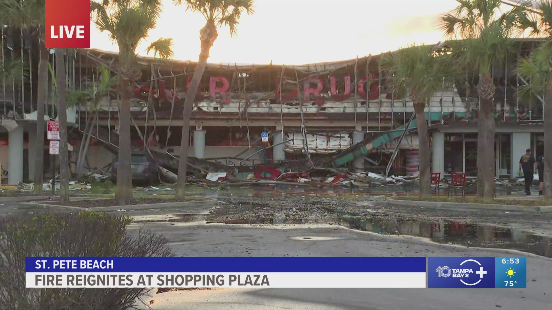 A fire that first broke out Tuesday afternoon in the CVS at a St. Pete Beach shopping plaza reignited Tuesday night, with flames spreading to the adjacent Publix.