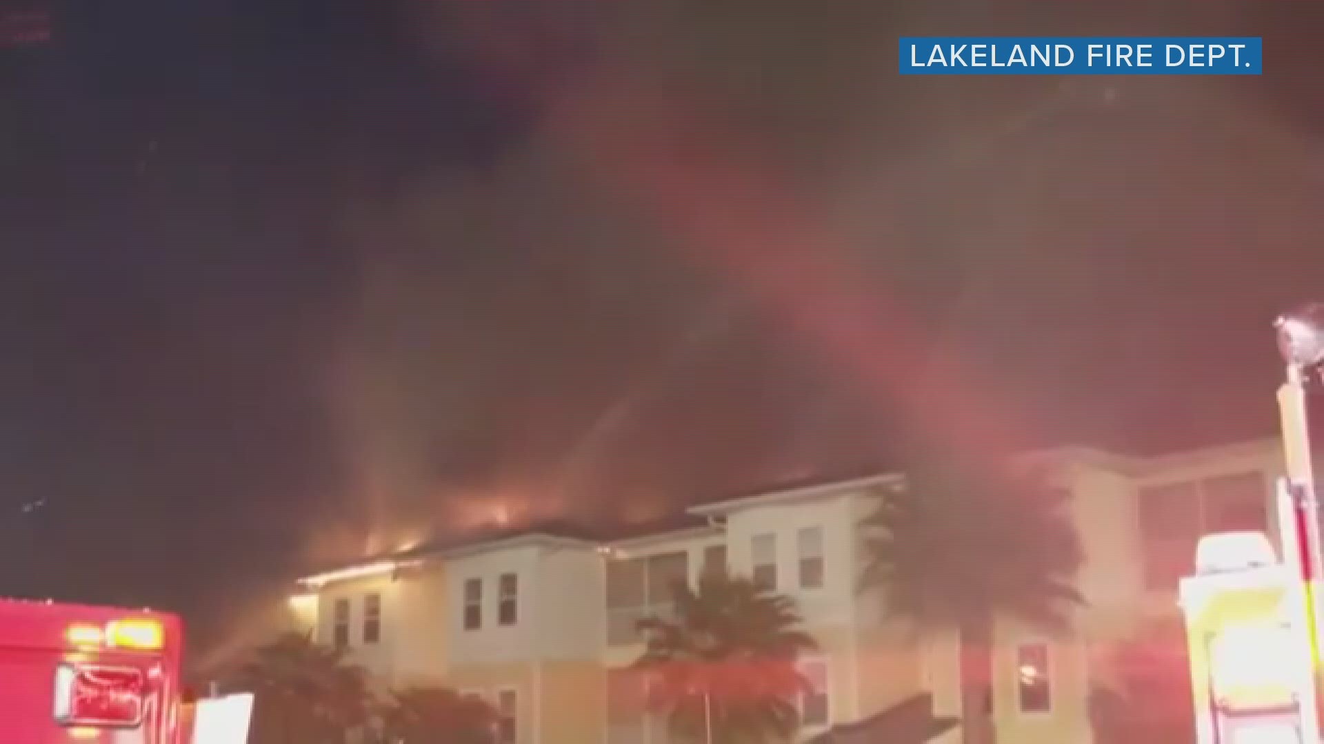 Residents at a Lakeland apartment building have been displaced as a fire burns through its roof.