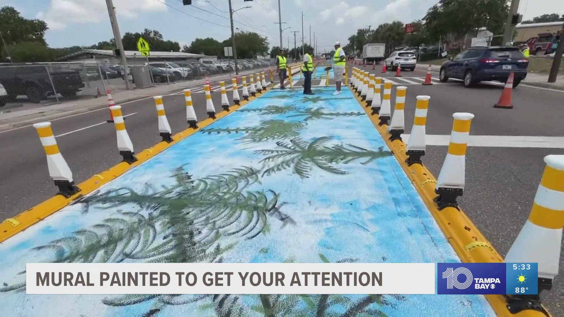 Friday, volunteers came together to paint a mural on the median on 78th Street in front of Clair Mel Elementary School in Tampa.