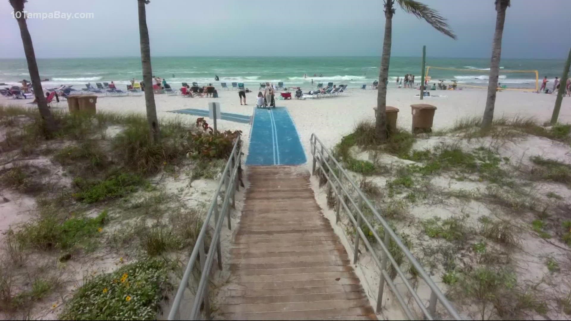 The mobility mat will help people avoid getting stuck in the sand, allowing them access to the beach.