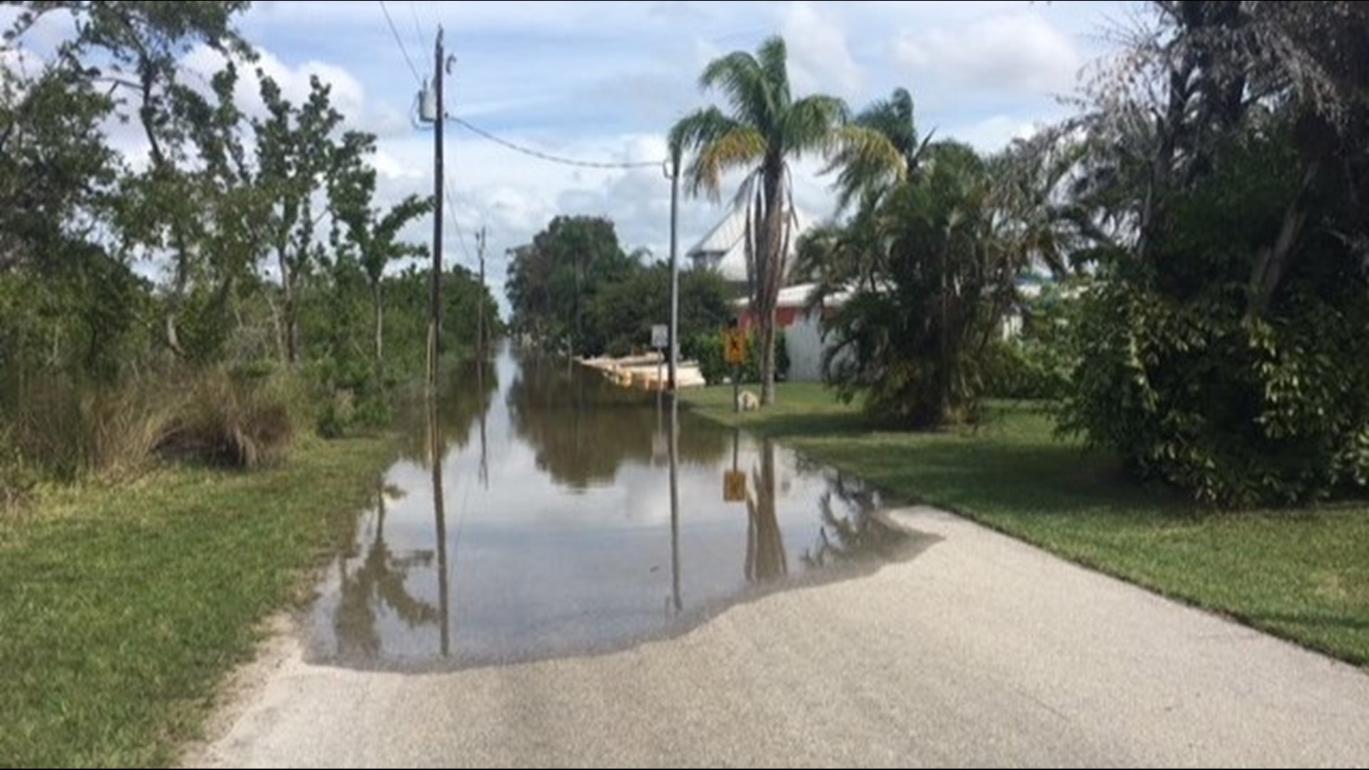 Photos High tide and storm surge causes flooding in Longboat Key, St