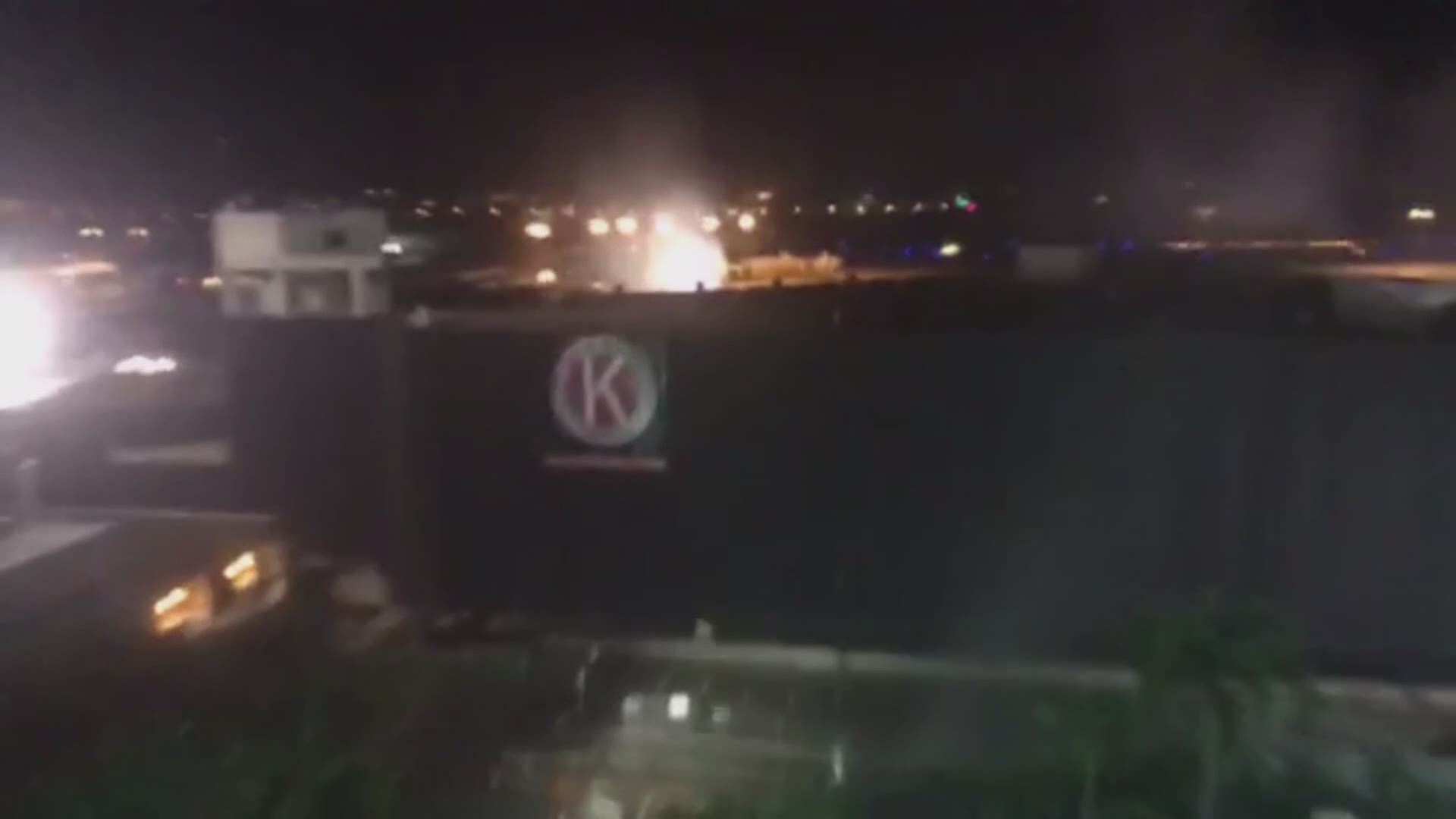 A large boom could be heard early Tuesday morning at Tampa International Airport, where crews demolished the old red side rental car garage around 2 a.m.