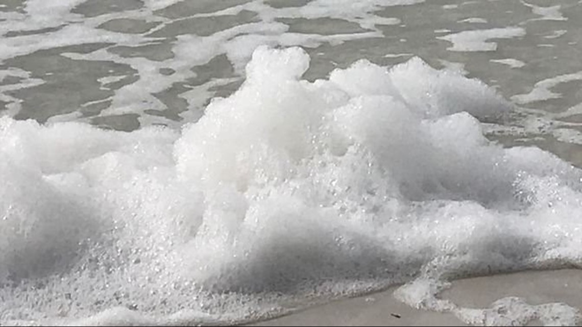 Scientists say sea foam washing up on Siesta Key may have red tide