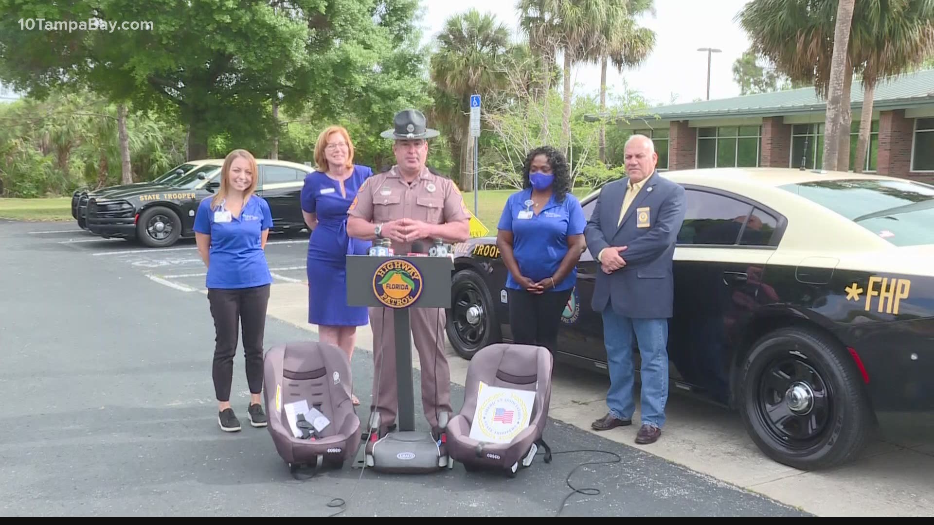 Florida Highway Patrol, Suncoast Credit Union and American Association of State Troopers team up to buy child restraints and booster seats for parents in need.