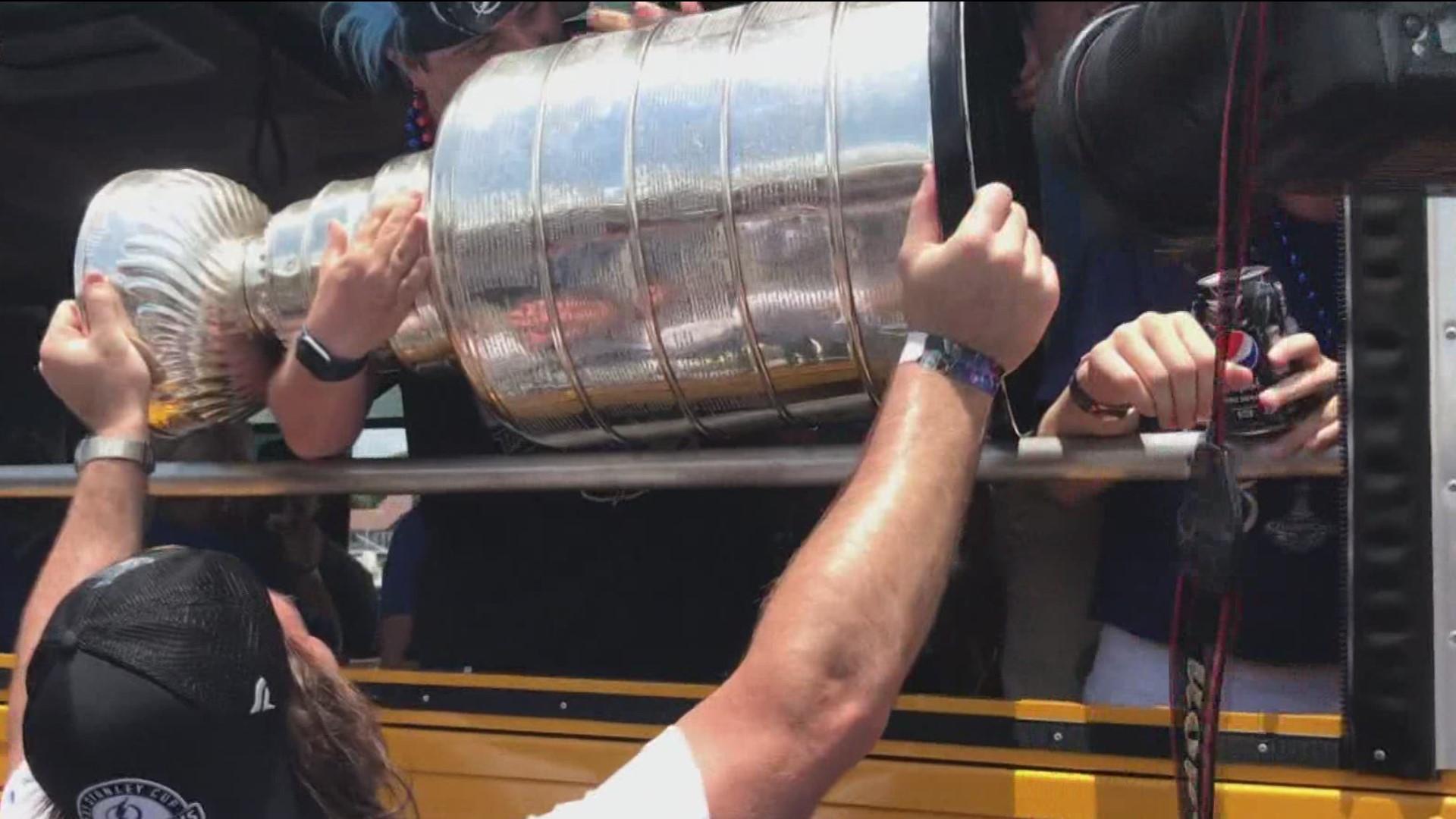 While the Stanley Cup didn't go for a swim during the Tampa Bay Lightning boat parade, it did sustain some apparent upper-body injury, the team confirmed.