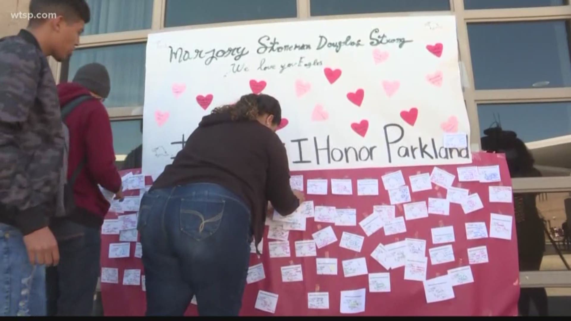 Students and staff wrote messages on eagle postcards marked with #HowIHonorParkland.