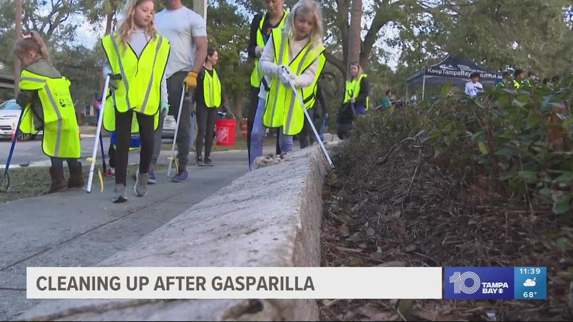 Hundreds of volunteers work to clean up garbage, beads left behind from Gasparilla festivities