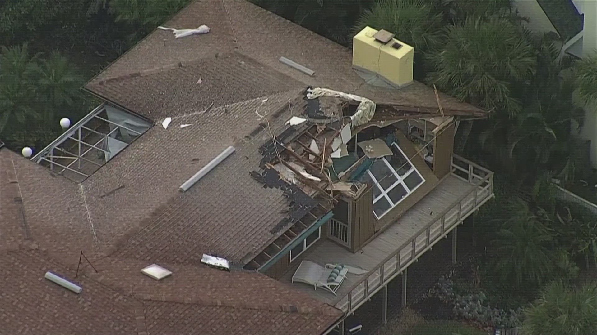 A large waterspout that came ashore as a tornado just north of Pier 60 caused damage in a north Clearwater Beach neighborhood.