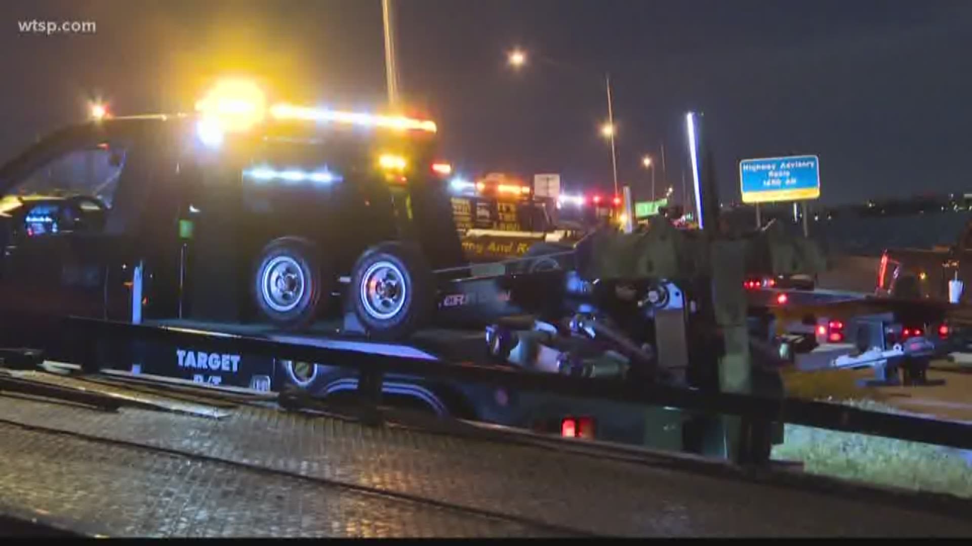 MOVE OVER. IT’S THE LAW. That’s the message of dozens of tow truck drivers lined up along the Tampa side of the Howard Frankland Bridge, where one of their fellow drivers was hit and killed on the job.