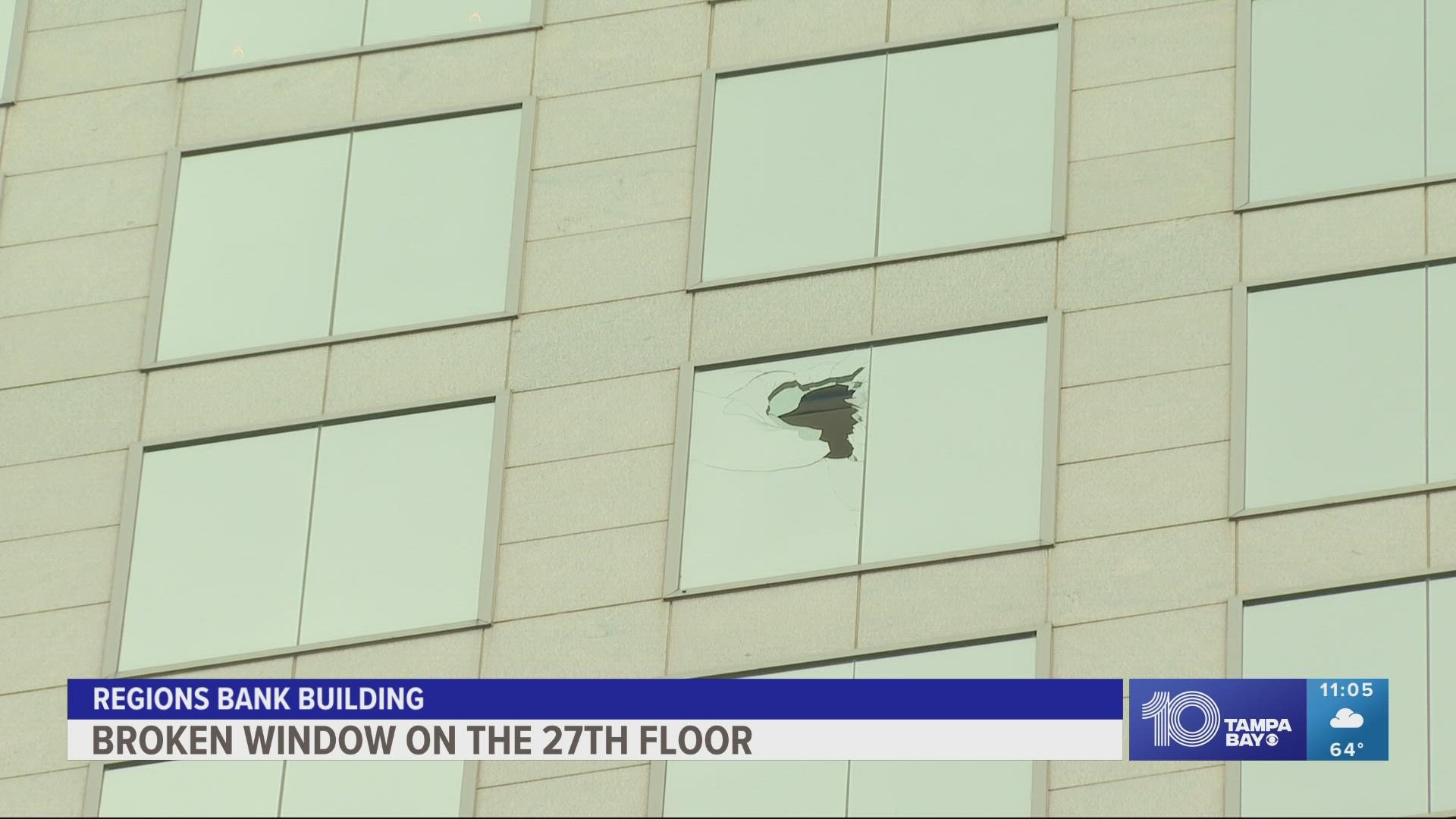 Police say a glass window broke on the 27th floor of the Regions Bank building on North Tampa Street.