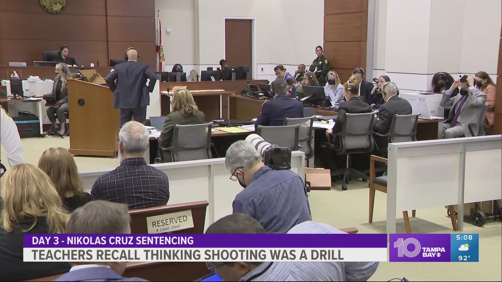 The testimony came a day after jurors saw surveillance video showing victims being gunned down at point-blank range.