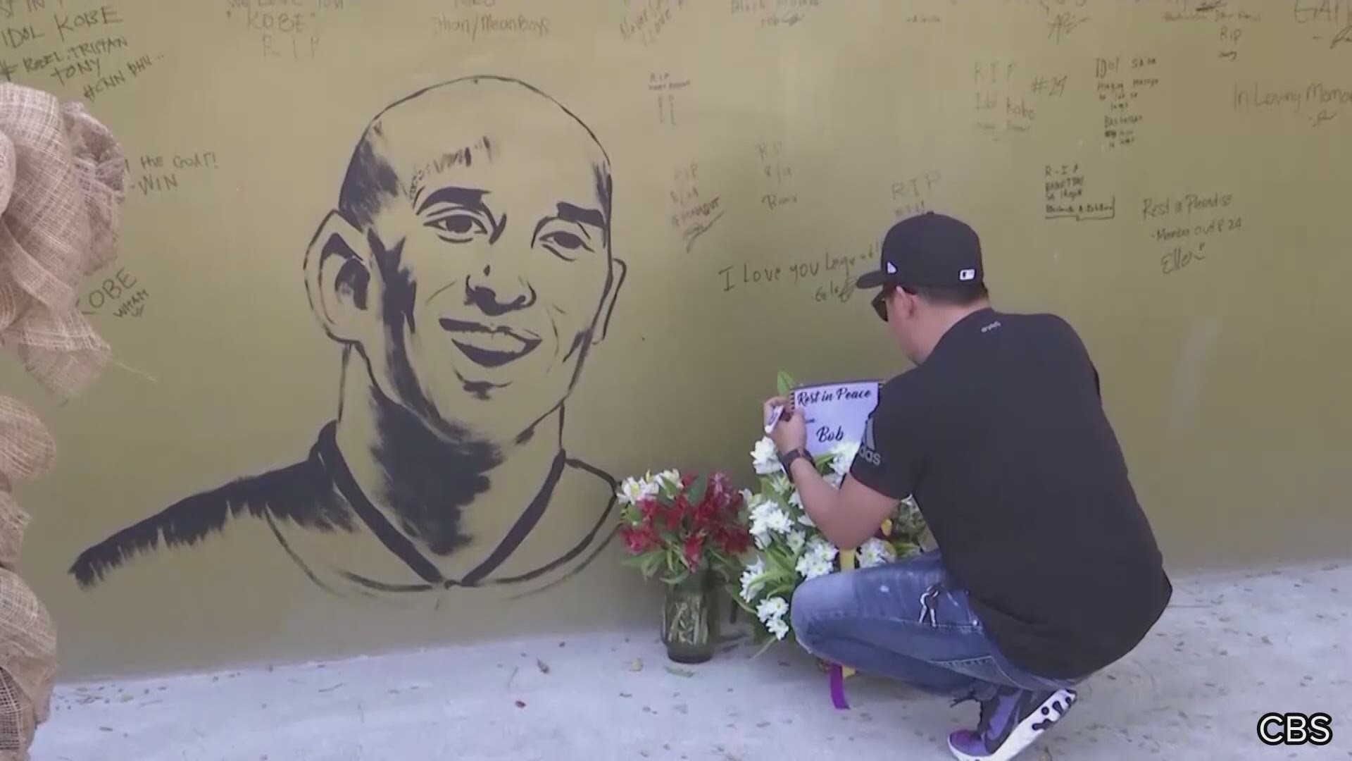 Fans in the Philippines offered flowers, wrote notes and lit candles outside a new "House of Kobe" basketball court in Manila to pay tribute to Kobe Bryant.
