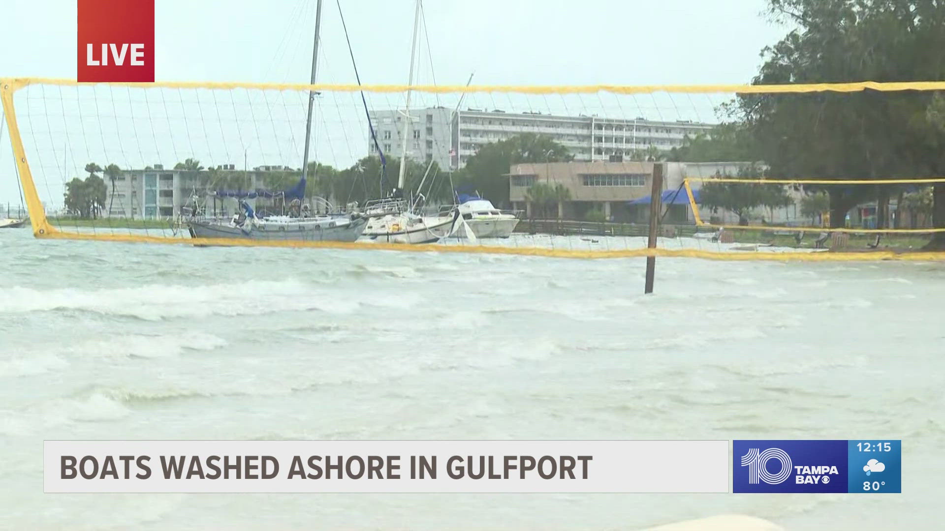 As water levels rise in Gulfport, boats are washing to the sand and water is flooding roads to knee-deep levels.