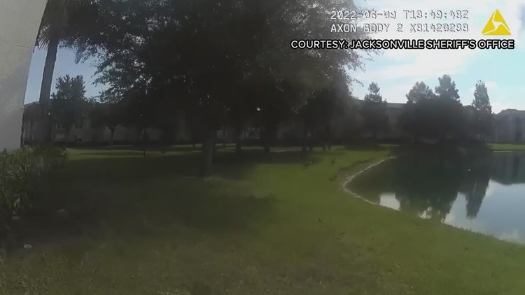 Florida police officer who can't swim jumps in pond to save baby