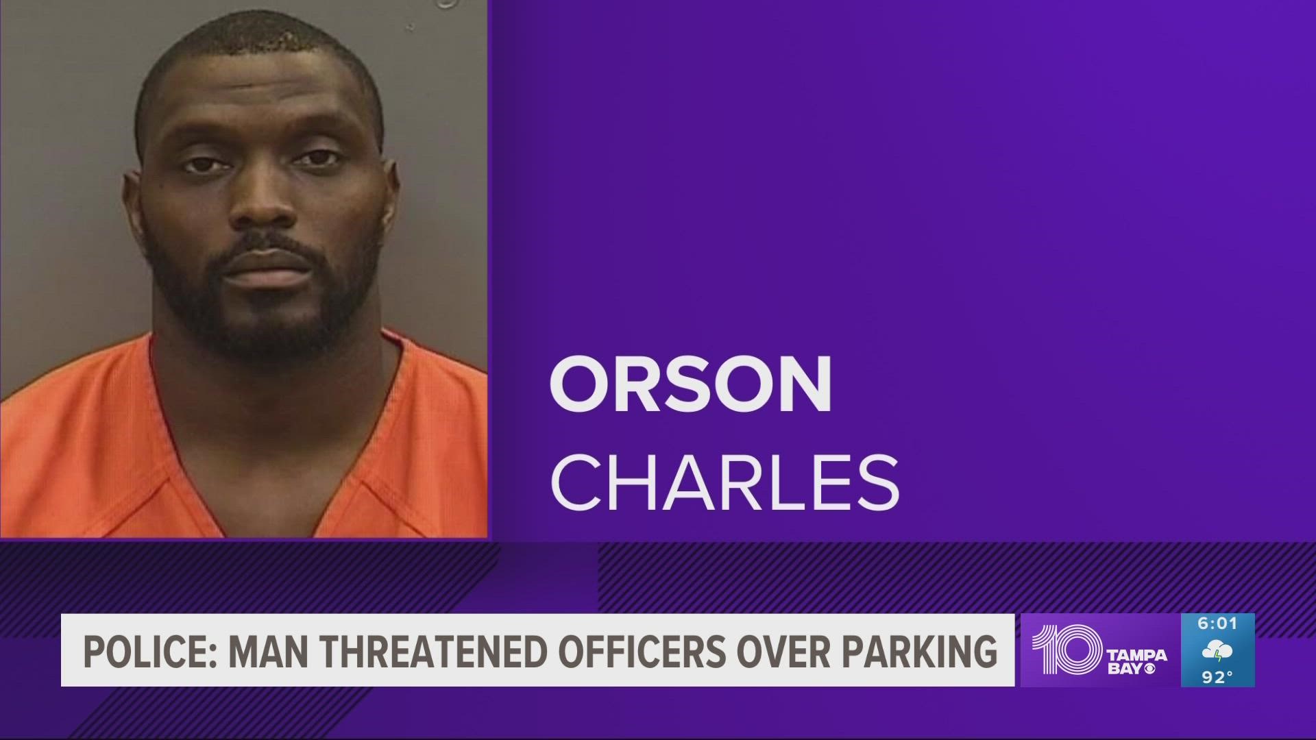 Orson Charles reportedly threatened to shoot two off-duty law enforcement officers over a parking spot dispute.