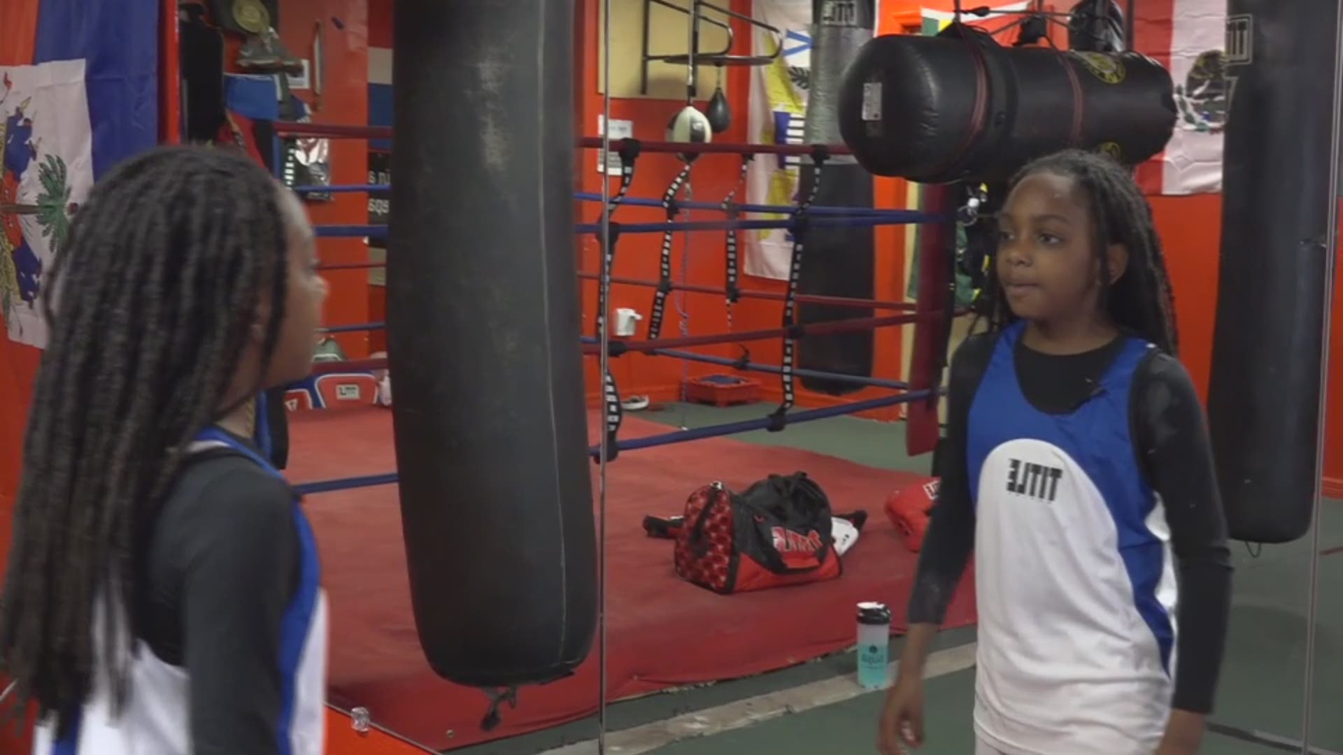 10 year old boxing talent speaks words of affirmation with dad's help