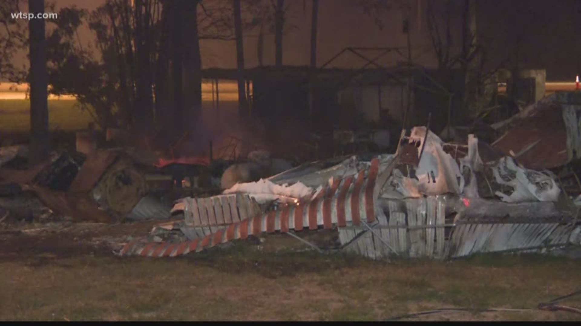Ten homes were destroyed at a mobile home park across the street when the propane tanks exploded. Dark smoke was billowing into the air from the scene near Twitty Road and U.S. Highway 27.