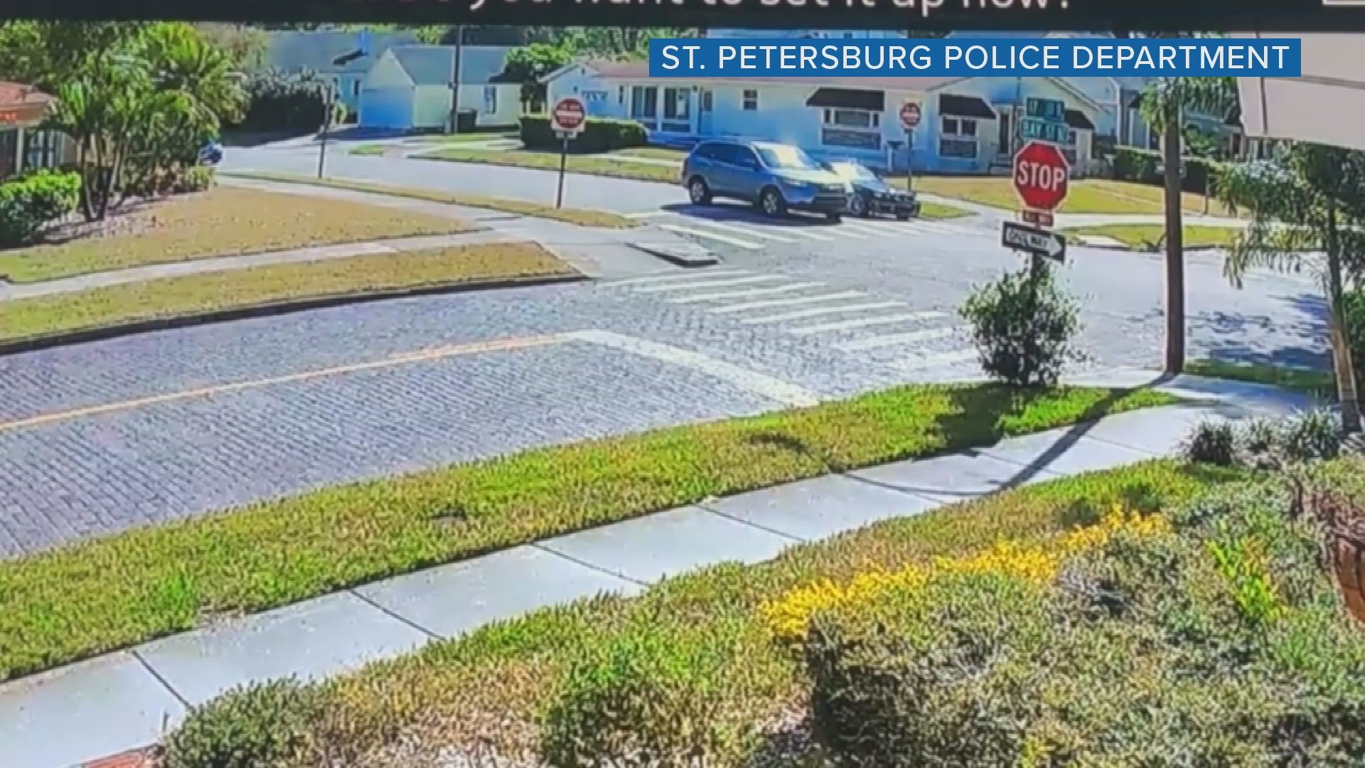 St. Petersburg police released video showing a blue 2012 Hyundai Santa Fe driving away from a BMW; the department says its occupants fired upon the people inside the BMW.