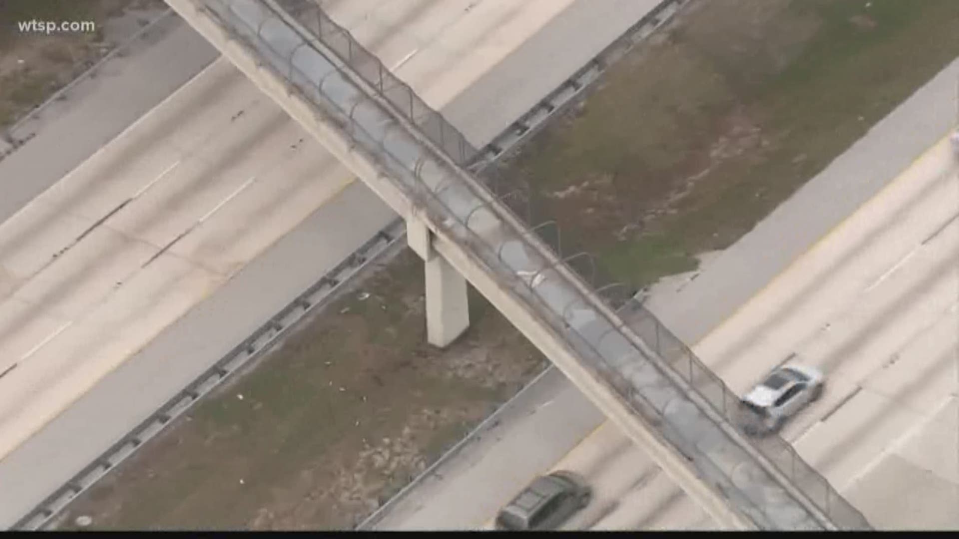 Police say the man was armed with a knife and moved toward officers on an I-275 pedestrian overpass