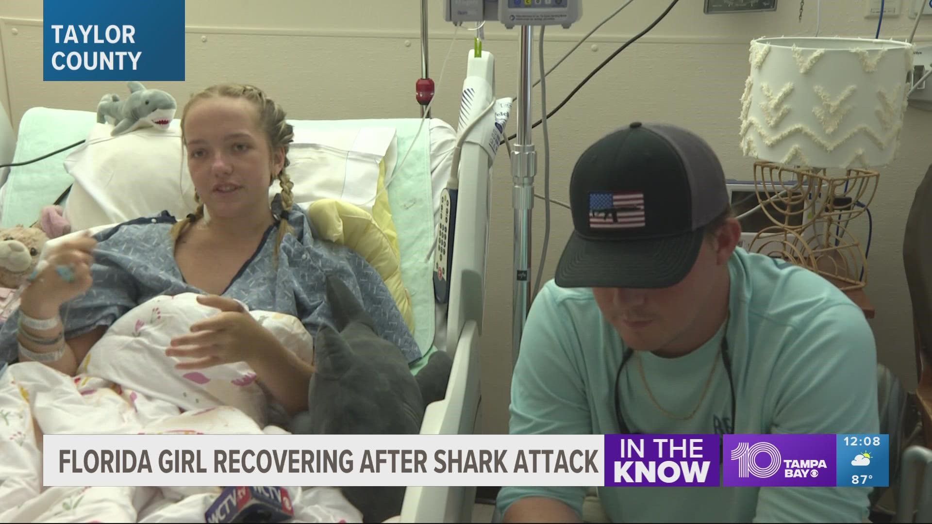 The 17-year-old was attacked by the shark while scalloping in about 5-6 feet of water with her family.