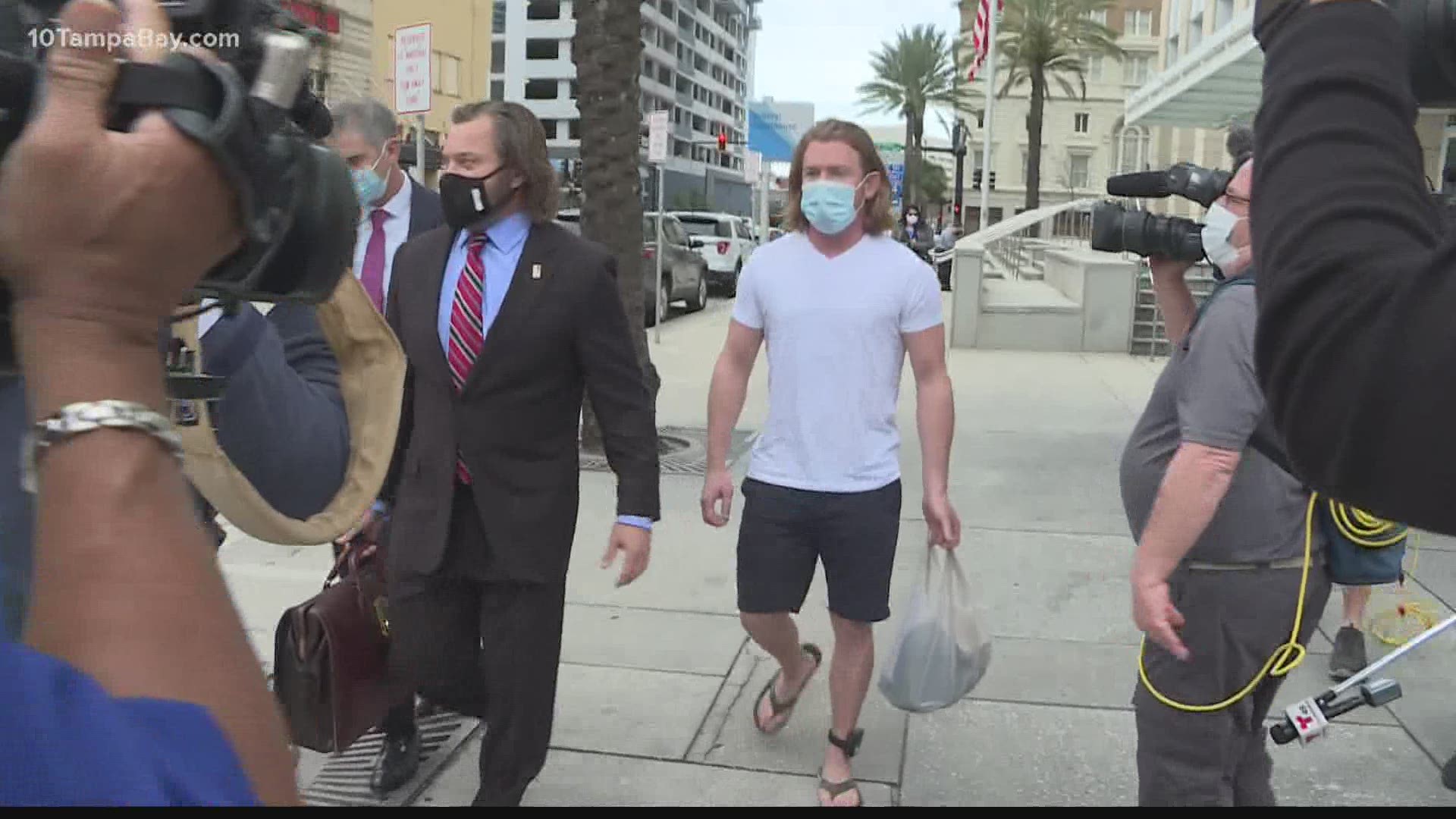 Adam Johnson was seen wearing a tracking device as he walked out of a Tampa courthouse.