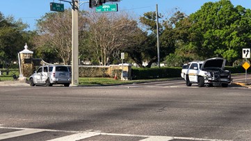 Sheriff's Office cruiser on emergency call hit by car