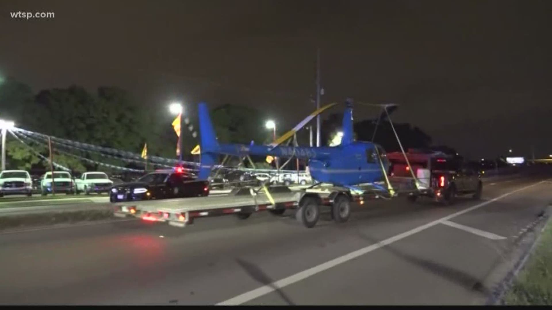 A shattered rotor blade flew into a truck, killing a passenger inside.