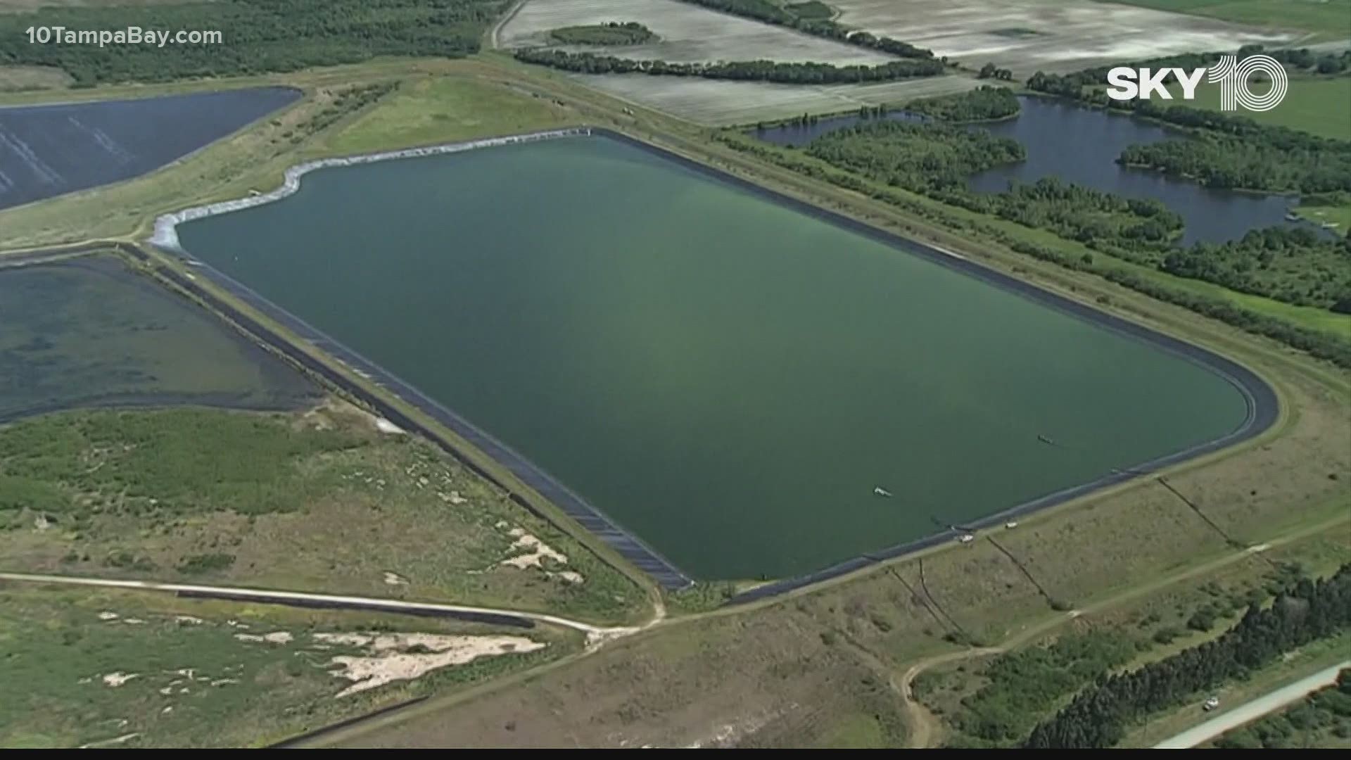 A full breach is possible at a retention pond holding between 700 and 800 million gallons of water, according to the acting county administrator.