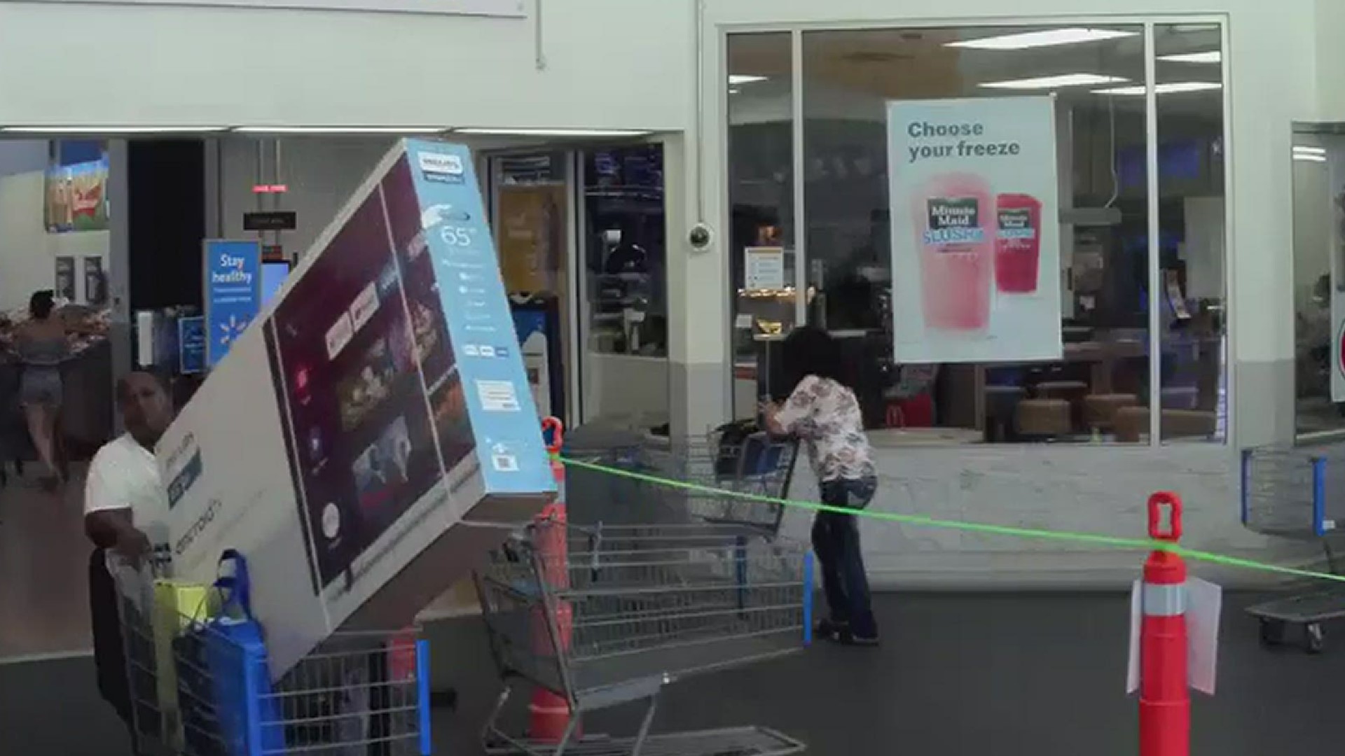 Polk County deputies search for a woman who was seen trying to cart off with 65-inch TV.