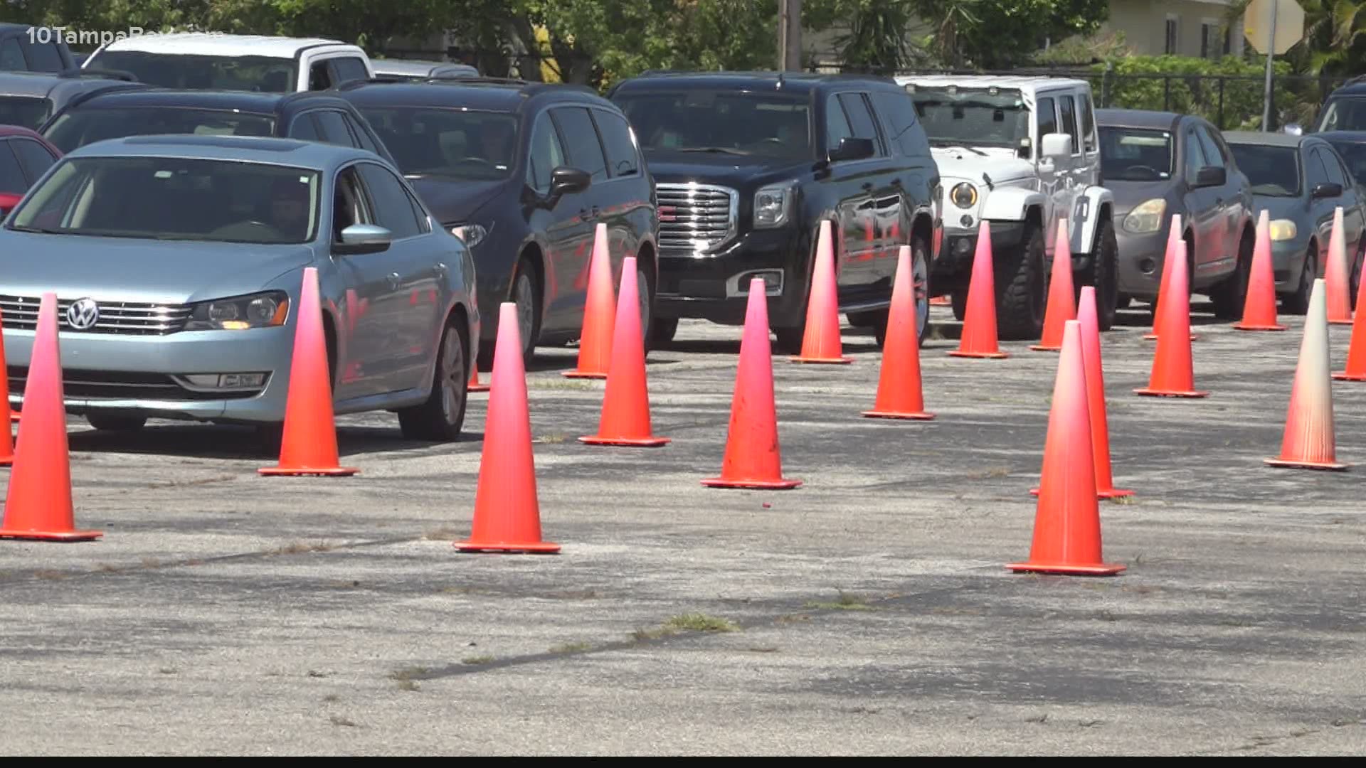 Nearly 80 cars waited in line just before midday at the Kennel Club drive-through testing site in Sarasota.