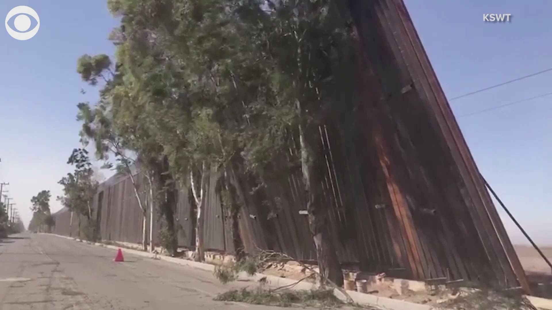 A part of the border wall between Calexico, CA and Mexicali, Mexico tipped over into Mexico on Wednesday afternoon, according to Mexicali police. Trees next to the w