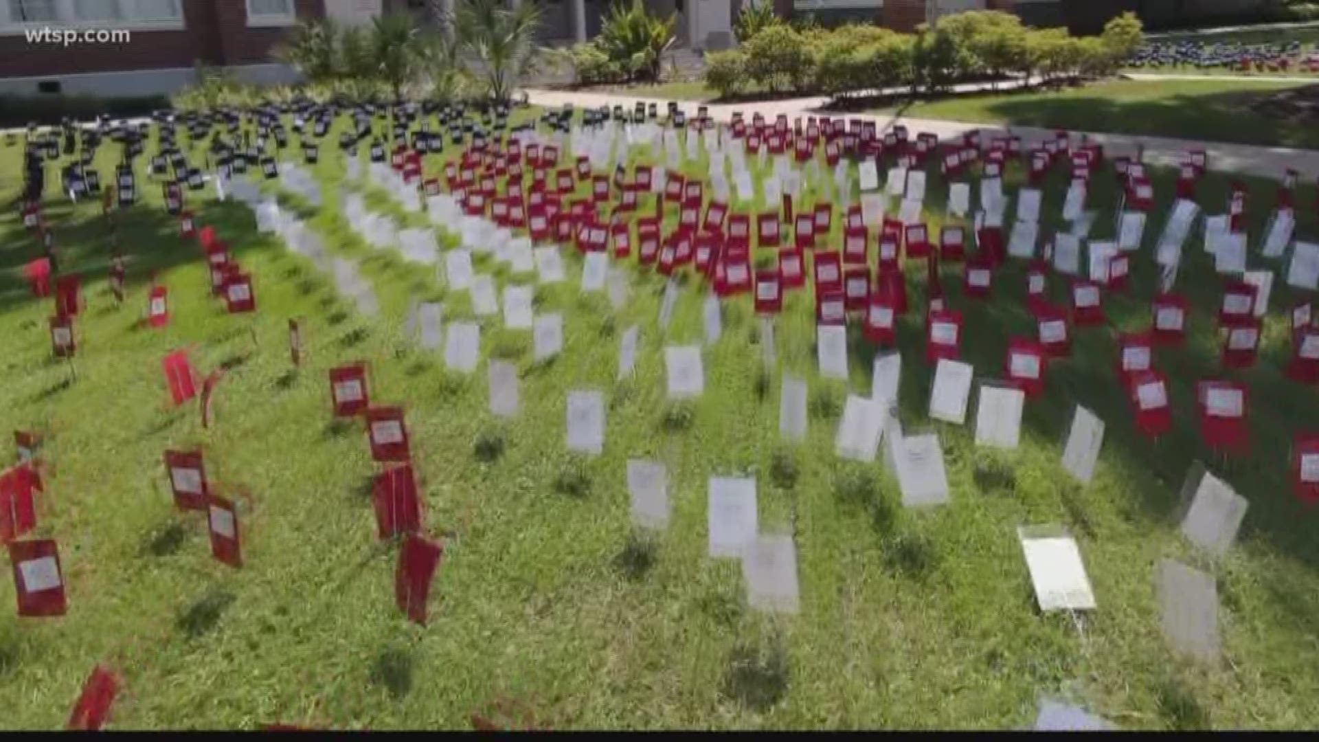 Students from Franklin Boys Preparatory Academy in Tampa made markers for each of the 2,977 lives lost in the 9/11 terrorist attacks. They spent the day placing them in the school's front lawn. Those kids weren't born yet when we were attacked, so a few speakers stopped by to share their experiences from that day.