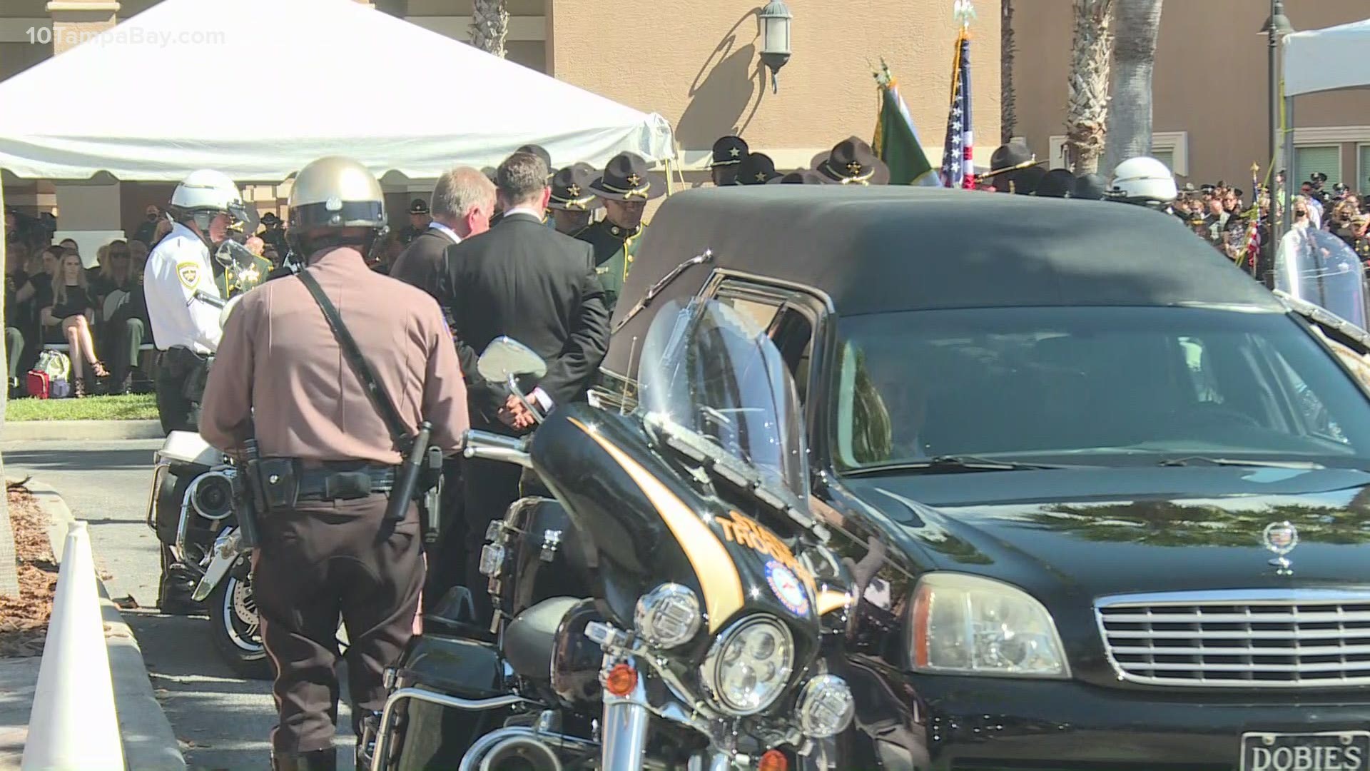 Following the service, law enforcement officers held a final honors ceremony for Deputy Magli including a 21-gun salute, a "missing man" flyover, and a last call.