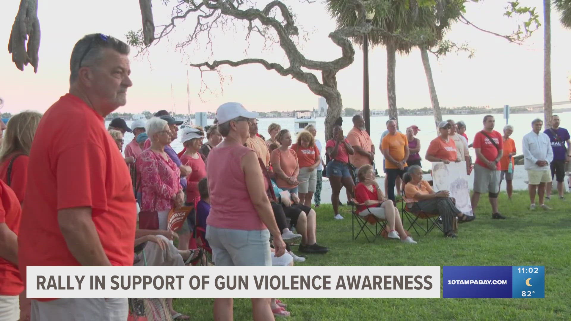 Demonstrators brought their own orange lights since the Ringling Bridge was supposed to light up for gun violence awareness.