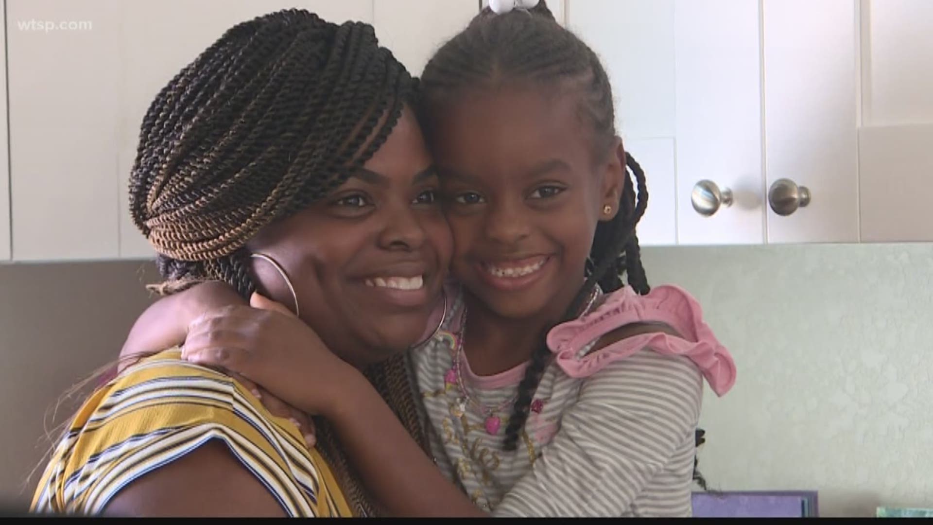 It's not jingle bells but the jingle of keys: the happy sound of the season for Shanequa Shorter and her daughter.