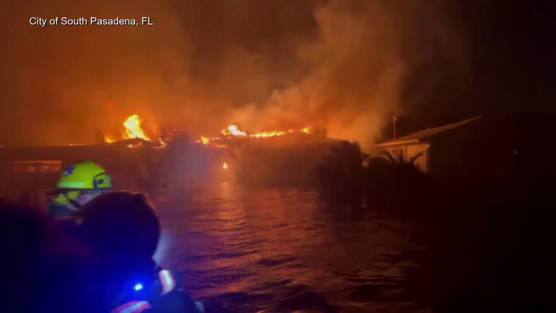 Search and rescue teams encountered a house on fire while out searching for survivors in surging flood waters in South Pasadena, Florida, on Friday.