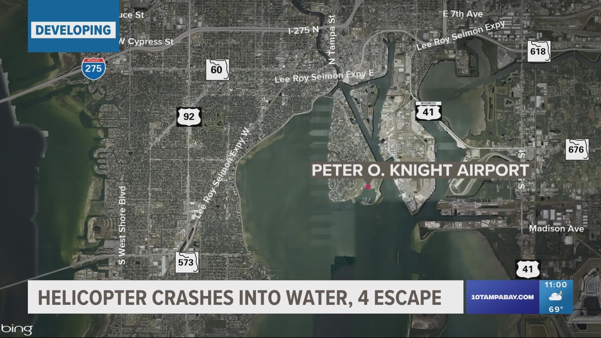4 people alive after helicopter crashes into water near airport on Davis Islands