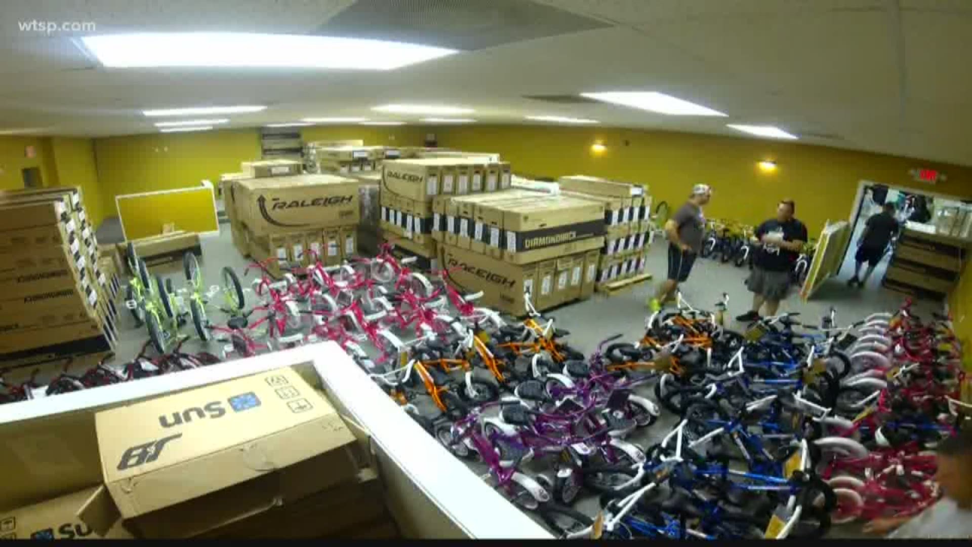About 1,000 volunteers will help out Santa to build 900 bikes in 6 hours.