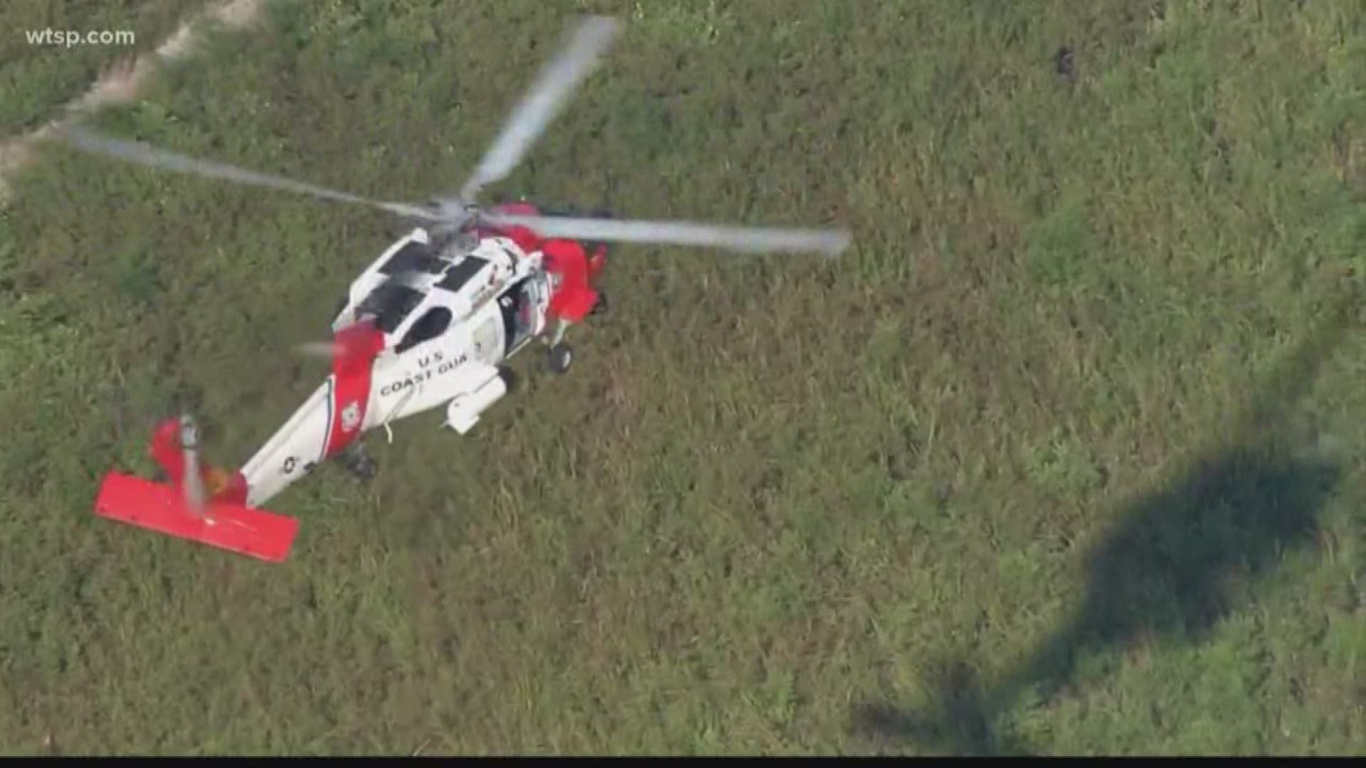 Both pilots are OK. The U.S. Coast Guard was able to airlift them both from the scene.