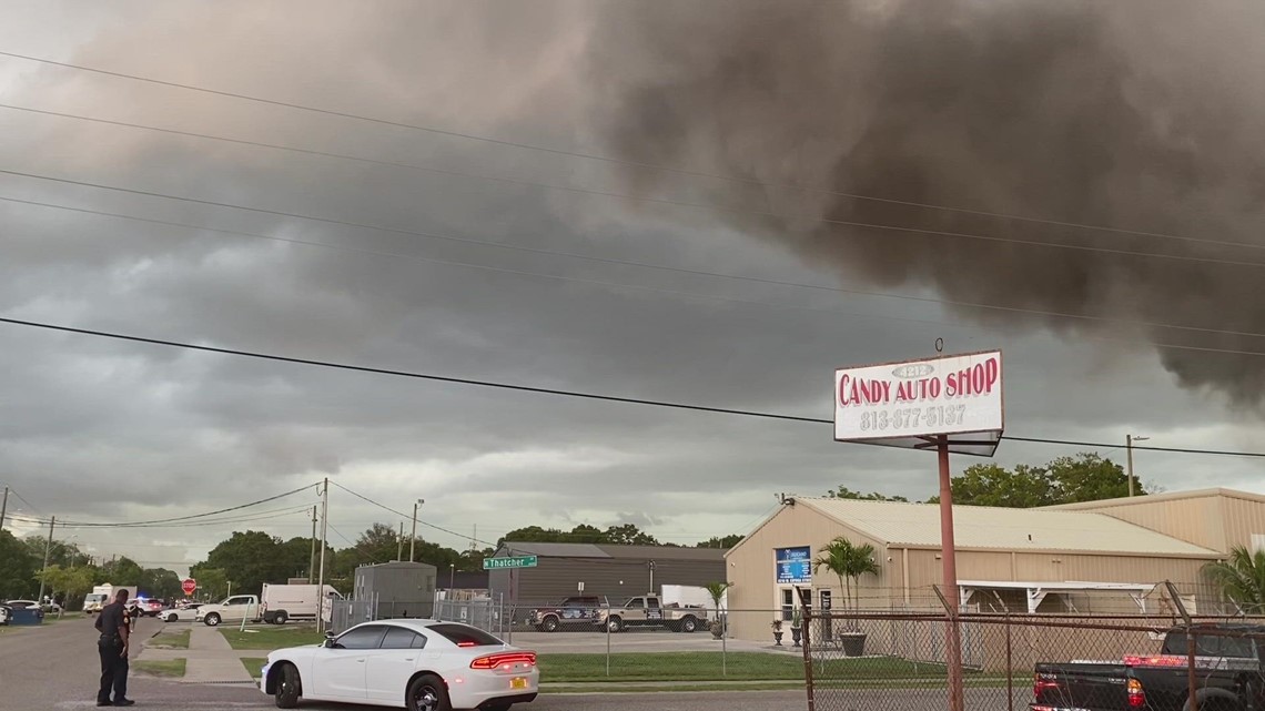 Scrap yard fire sends smoke into the air above Tampa