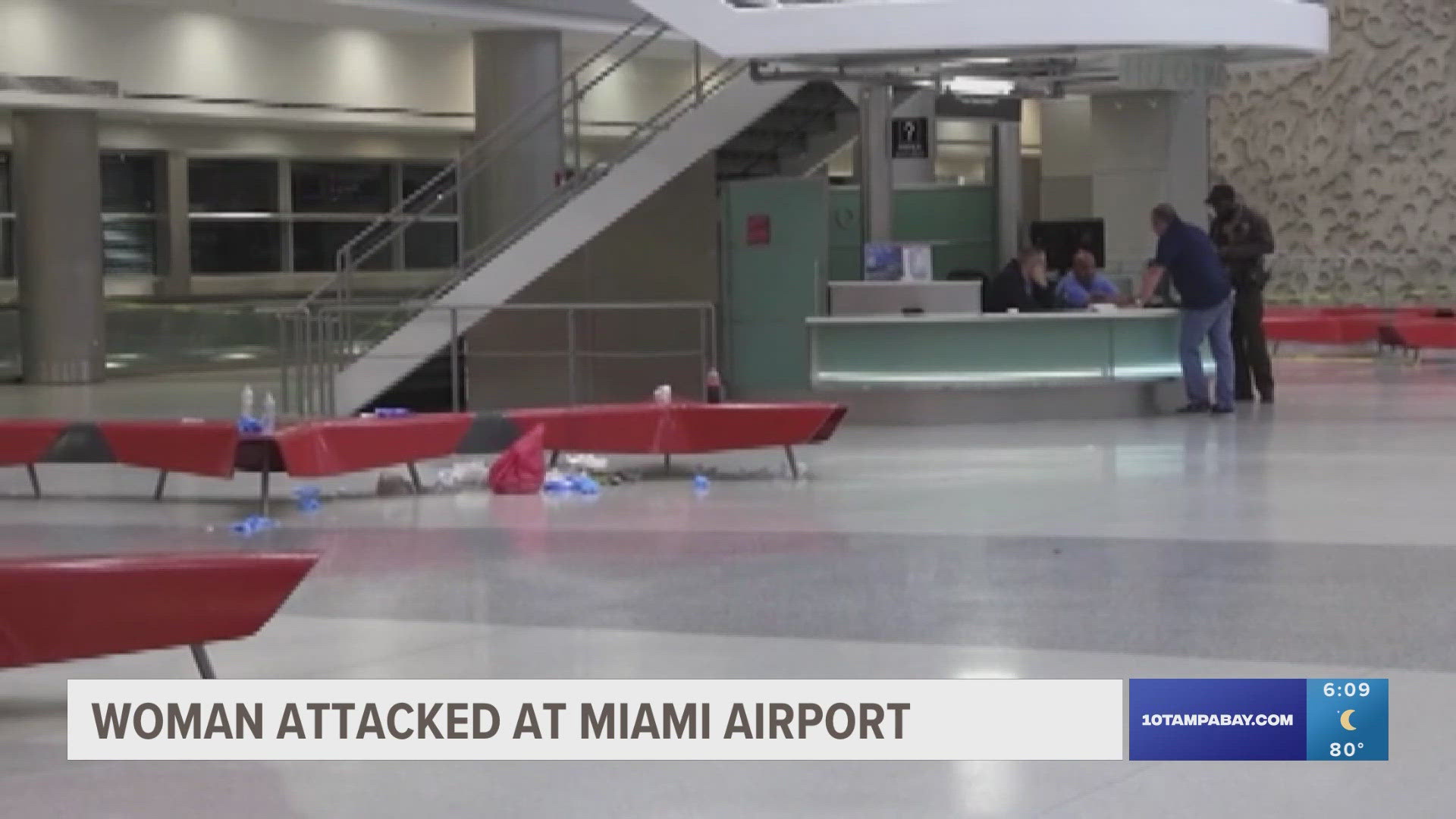 A woman was stabbed "multiple times" before almost being thrown off a balcony at Miami International Airport.