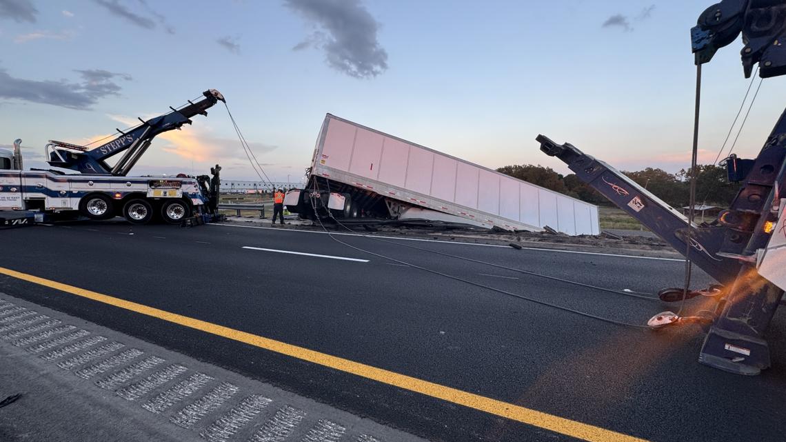 Semi-truck hanging off overpass on Polk Parkway East - Vimarsana News