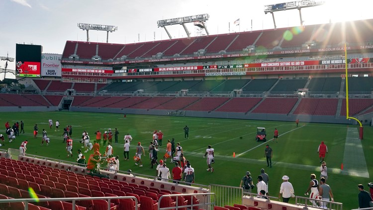 Bucs fans tailgate outside Raymond James Stadium