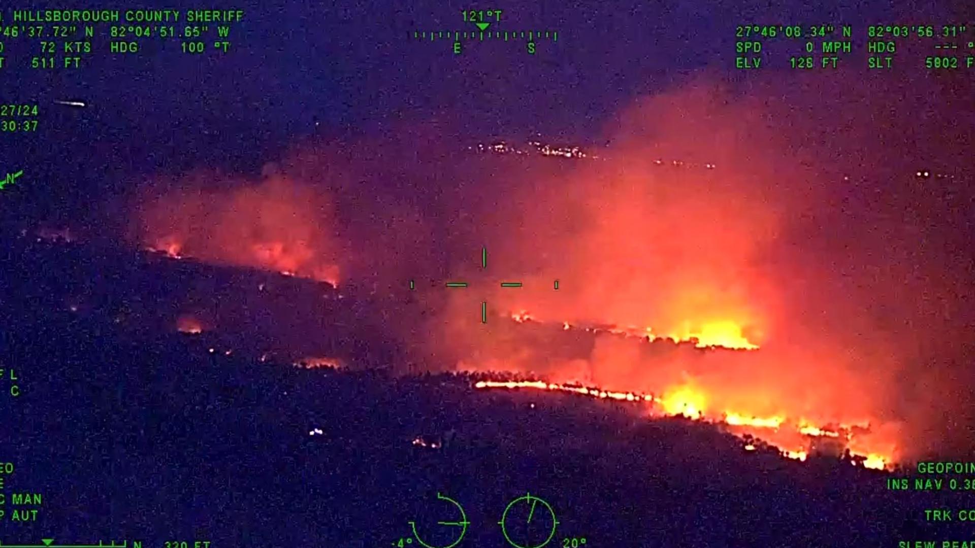 Video from a Hillsborough County Sheriff’s Office aerial unit Saturday night shows the orange flames of a brush fire near the Alafia River State Park.