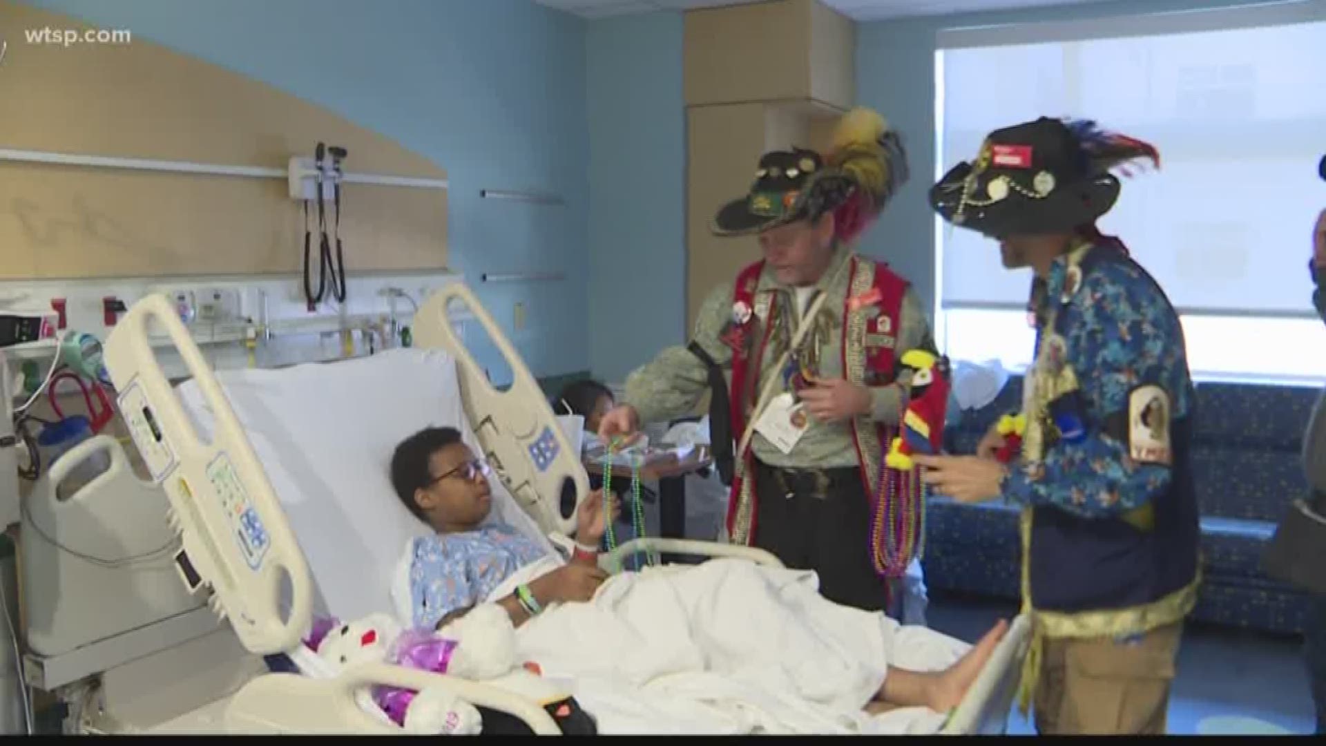 The pirates "invaded" Johns Hopkins All Children's Hospital to hand out toys for kids who couldn't make it to the Gasparilla Children's Parade.