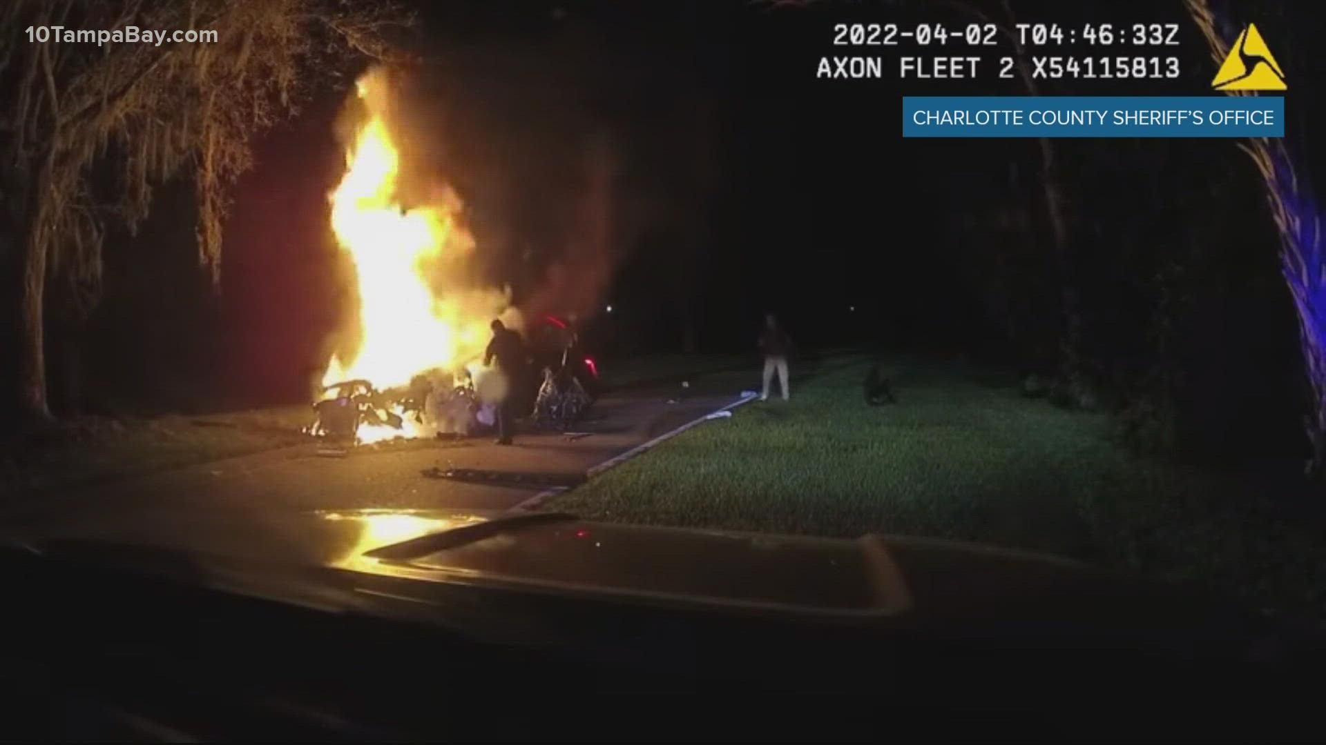 The deputies used a pocketknife to free the man from his seatbelt while battling the flames overtaking the car.